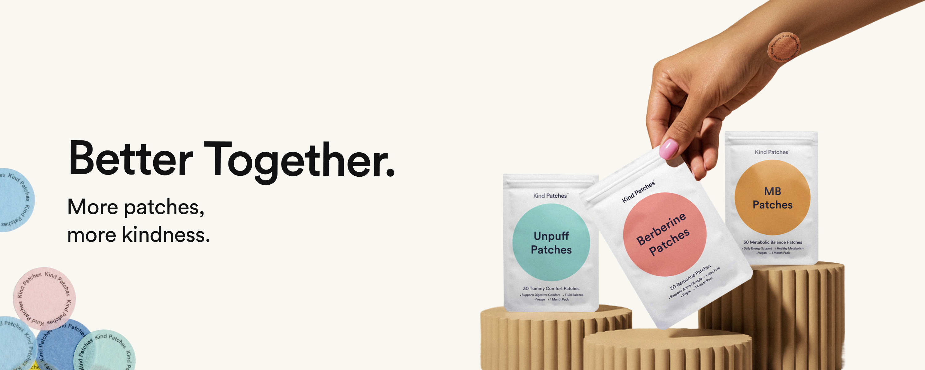 Kind Patches 'Better Together' bundle frame with patch pouches being selected by hand