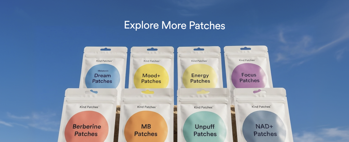 Kind Patches storefront banner titled 'Explore More Patches' showing Dream, Mood+, Energy, Focus, Berberine, MB, Unpuff and NAD+ patch pouches against a blue sky
